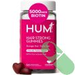 Strawberry-flavored HUM hair growth support gummies, non-GMO and free from artificial colors