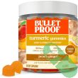Bulletproof vegan turmeric supplement gummies in a 60-count jar, made for daily joint health and wellness support.