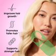HUM Hair Strong strawberry gummies with biotin, zinc, folic acid and vitamin B12, 60-count bottle