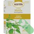 "Cup of brewed Alvita Organic Nettle Tea showing rich amber color"

