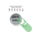 "Close-up of Hawkins & Brimble Beard Balm texture in 50g container"

