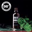 "Close-up of Hawkins & Brimble Beard Oil 50ml showing smooth oil texture"

