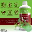 "Buried Treasure Herbal Iron Supplement 16 oz bottle with fresh spinach leaves"

