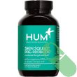 Dosage instructions and warnings on Hum Skin Squad supplement bottle.

