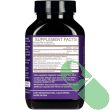 Close-up of Hum Turn Back Time vegan capsules inside bottle with purple packaging.

