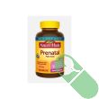 Nature Made Prenatal Folic Acid Multivitamin Tablets on clean white background with cap removed.

