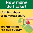 Open bottle of Nature Made Vitamin D3 2000 IU Gummies showing soft fruit-flavored gummies.

