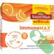 Wellblends ImmuneMax stick pack and glass of mixed drink showing product use

