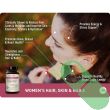 "Close-up of NatureWise Women's Multivitamin Hair Skin Nails Support showing vegetarian capsule shape and supplement facts."

