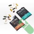Onnit Total Human night pack capsules displayed next to packet

