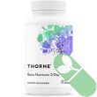 Side view of Thorne Basic Nutrients 2/Day Complete Multivitamin 60 Caps showing capsule size and white plastic safety seal.

