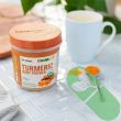 "BareOrganics Turmeric Root Powder with fresh turmeric roots"

