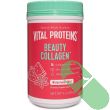 Vital Proteins Beauty Collagen Powder in water with fresh lemon and strawberry – natural beauty supplement scene