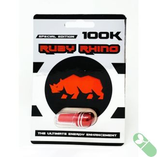 "Ruby Rhino 100K pill in clear blister pack showing red metallic capsule design"

