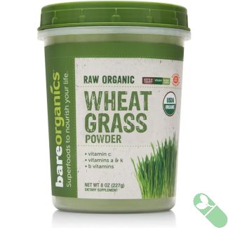 "Close-up of BareOrganics Wheat Grass Powder showcasing fine green texture"


