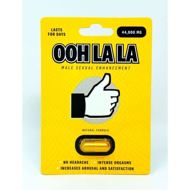 Close-up of Ooh La La pill showing golden capsule and intense orgasm benefits

