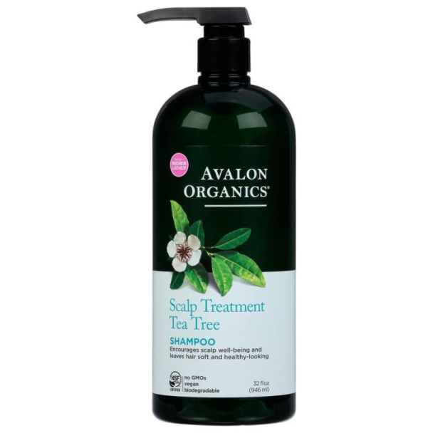 Avalon Organics Scalp Treatment Tea Tree Shampoo 32 oz bottle on a bathroom shelf

