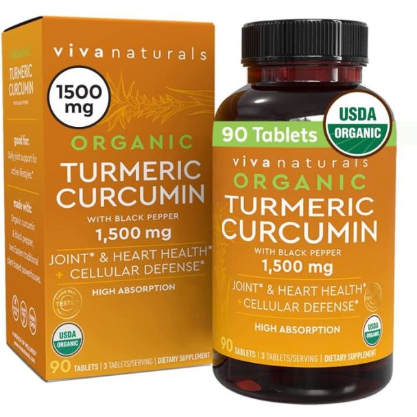 Viva Naturals Organic Turmeric Curcumin bottle with capsules spilled beside highlighting pure organic turmeric powder

